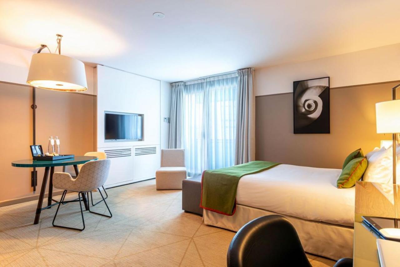Fraser Suites Paris La Defense Courbevoie Exterior photo A room at the hotel