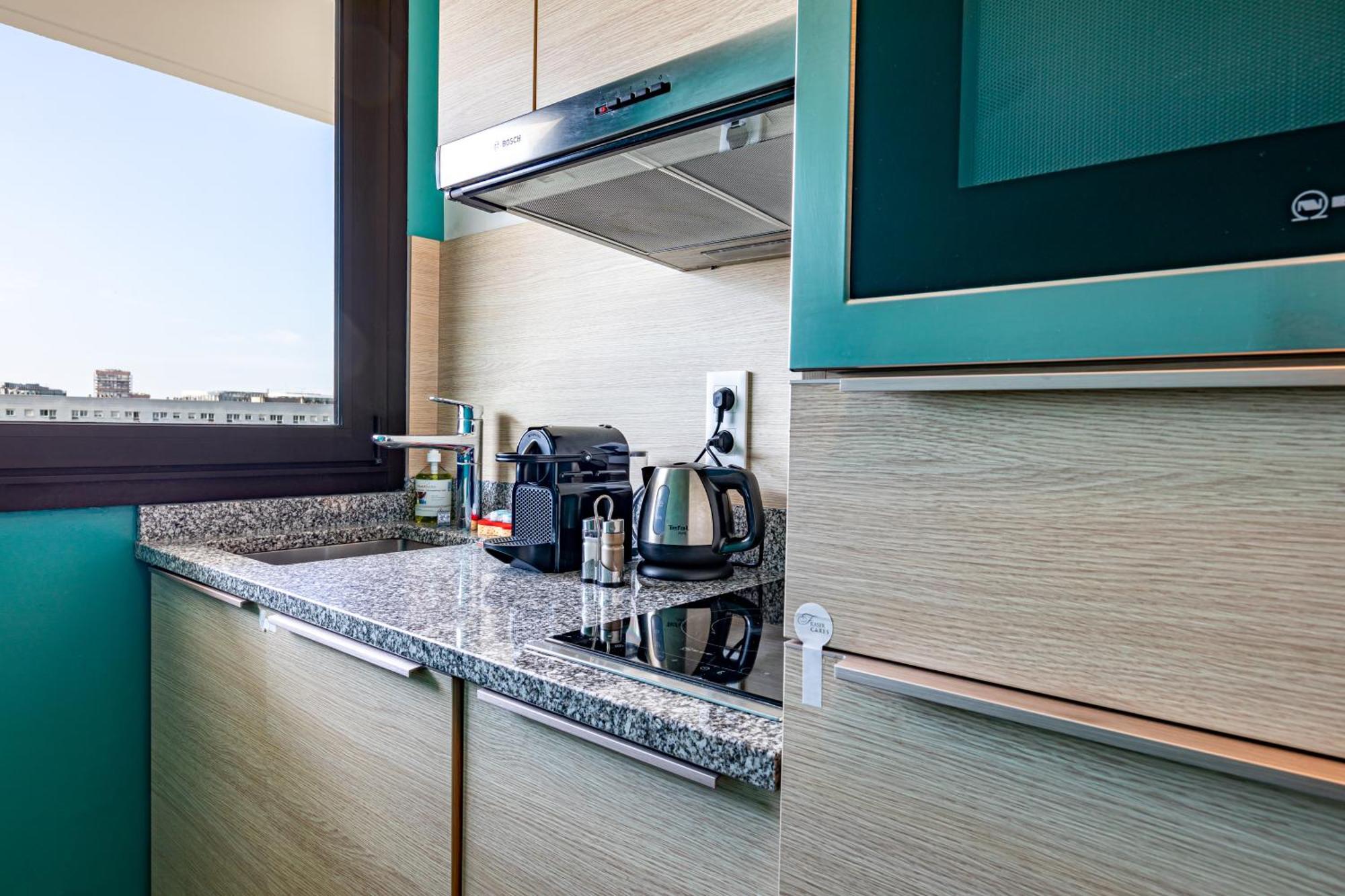 Fraser Suites Paris La Defense Courbevoie Exterior photo A typical kitchen in a student residence hall